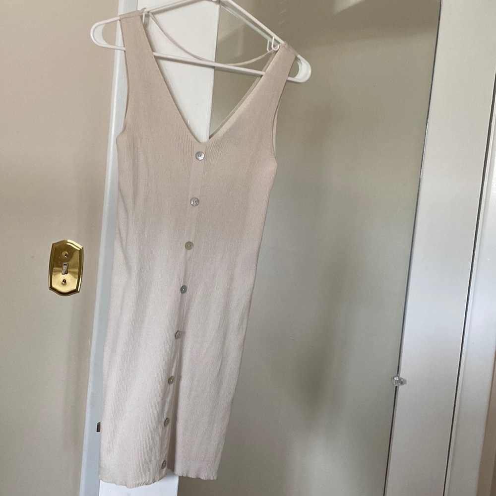 Beige thin sweater dress with mother of pearl buttons
